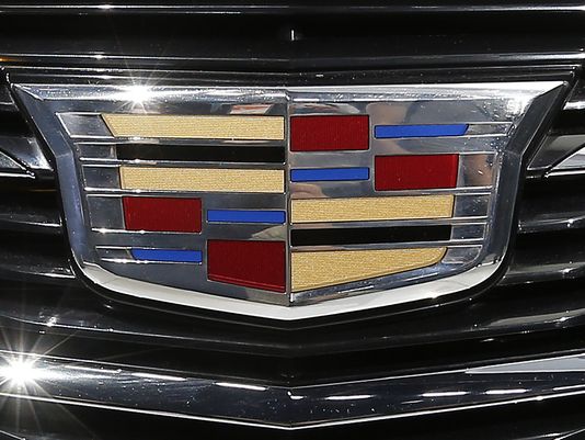GM execs defend Cadillac headquarters move to NY