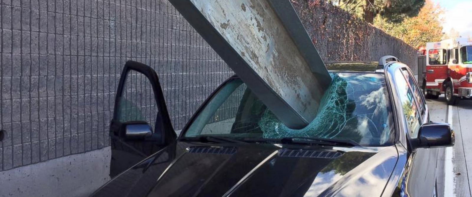 BMW Driver Has Close Call When Giant Piece of Metal Impales Windshield
